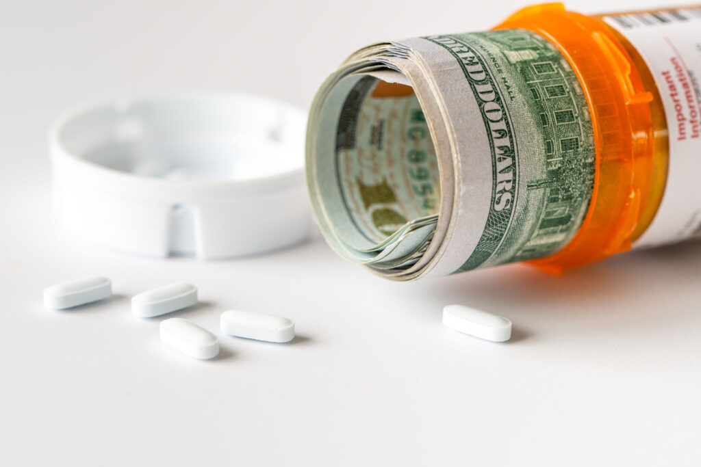 money rolled up inside prescription pill bottle