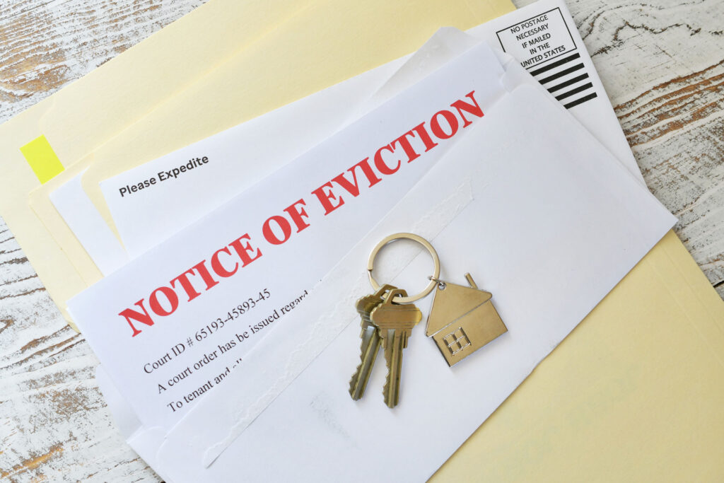 eviction letter with house keys on top