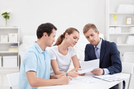 husband and wife at a credit counseling session