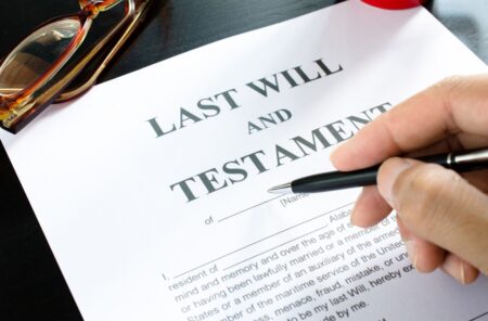 last will and testament with person signing it