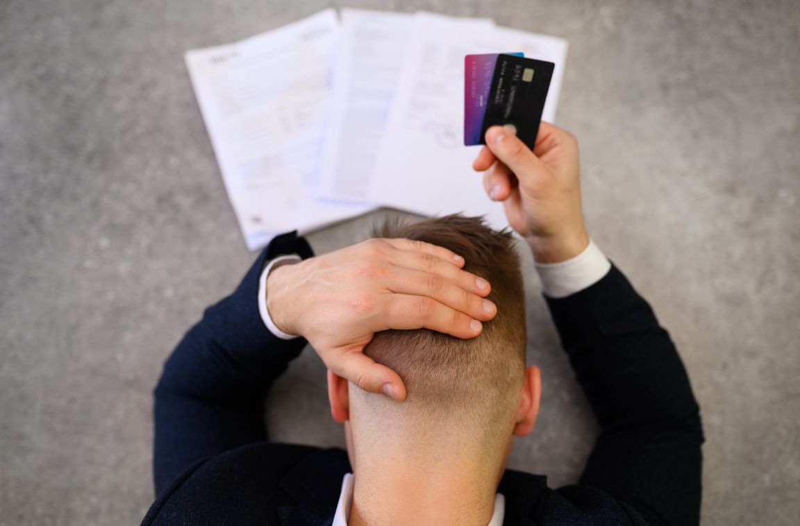 what to do if you're behind on credit card debt man behind on credit card debt