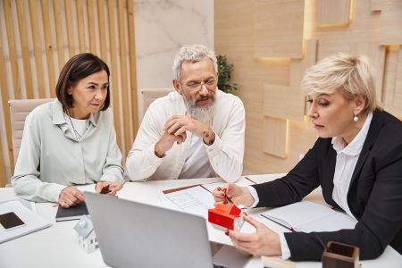 Estate planning attorney helping couple with elder financial abuse