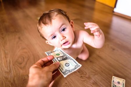 Baby wants dollar bill