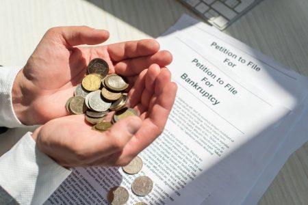 Businessman holding coins