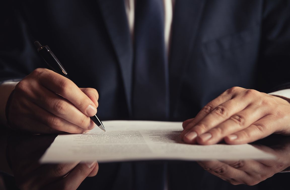 a bankruptcy lawyer filling out an application for their client
